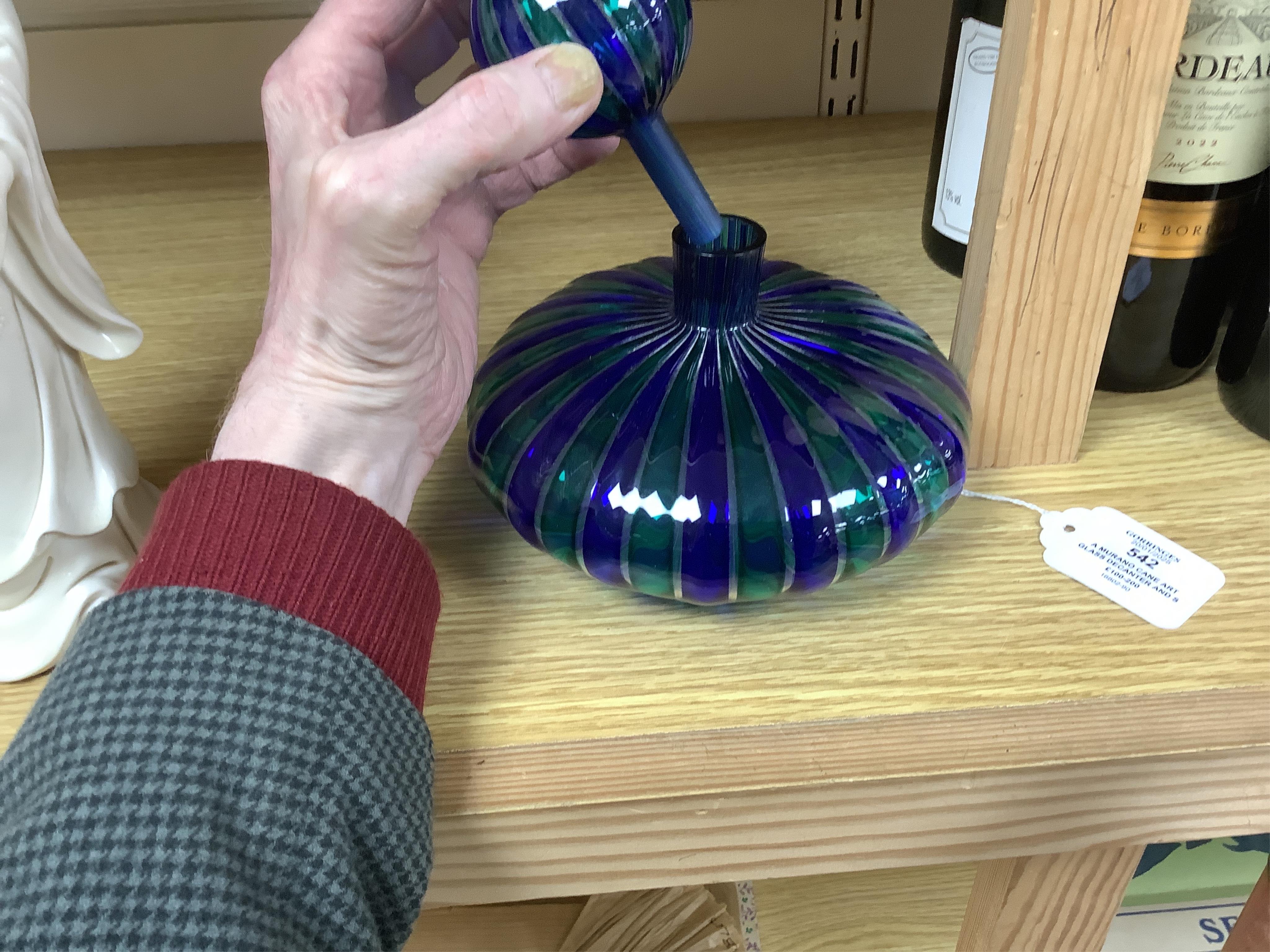 A Murano cane art glass decanter and stopper by Orlando Zennaro, signed to the base, 17cm high. Condition - good